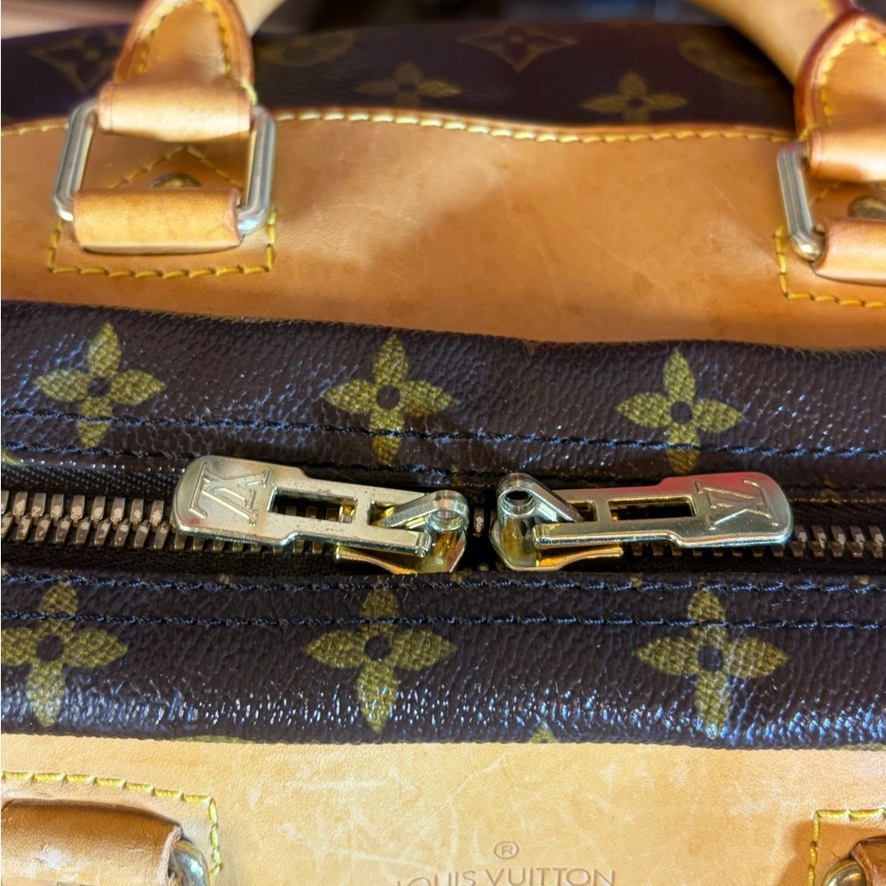 Louis Vuitton Evasion Monogram Travel Bag - Picture 9 of 16